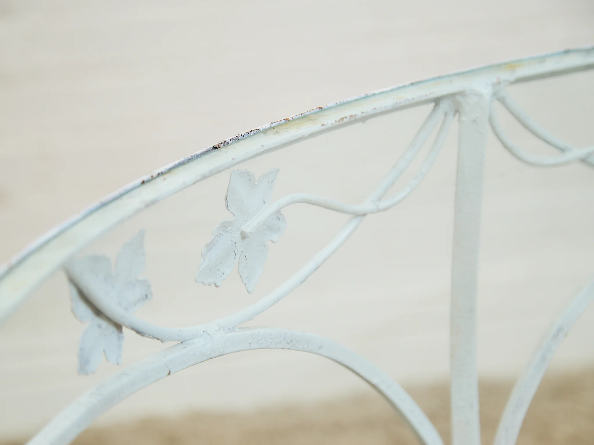 Vintage Wrought Iron Patio Dining Table with Leaf Motif Aqua Cushions and Glass Top - Image 11
